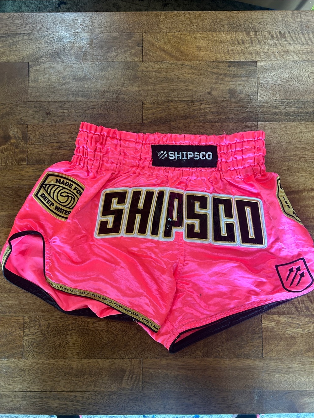 Pink  Muay Thai shorts are branded by SHIPSCO small